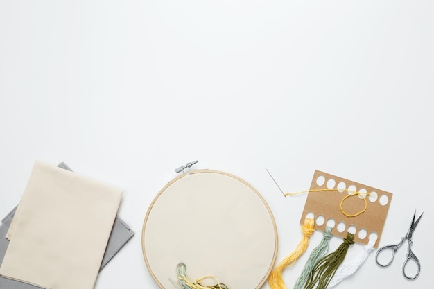 studio workspace with embroidery hoops
